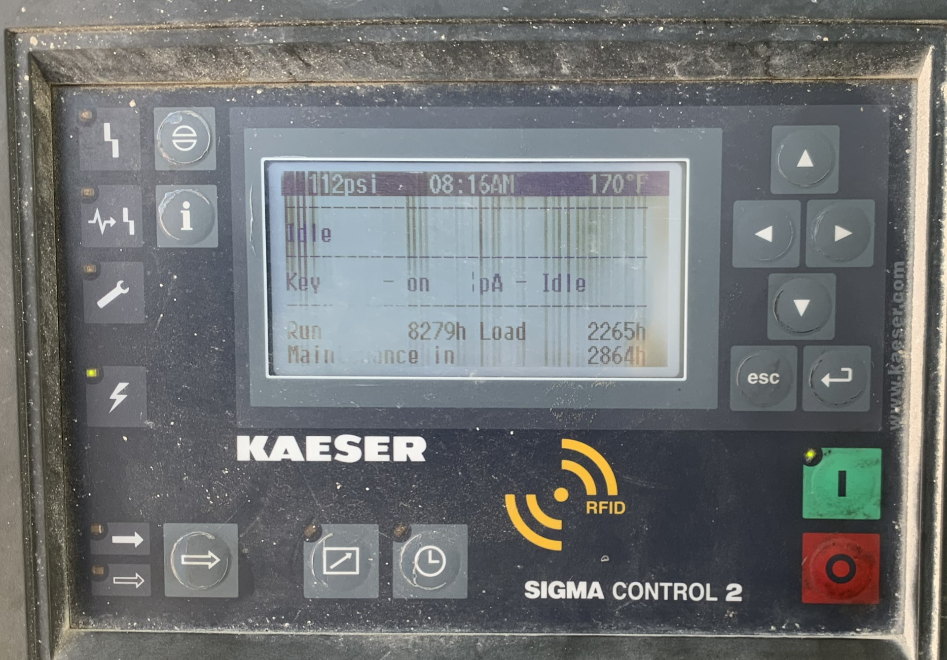 Weathered and dust-covered Kaeser Sigma Control 2 controller left unprotected