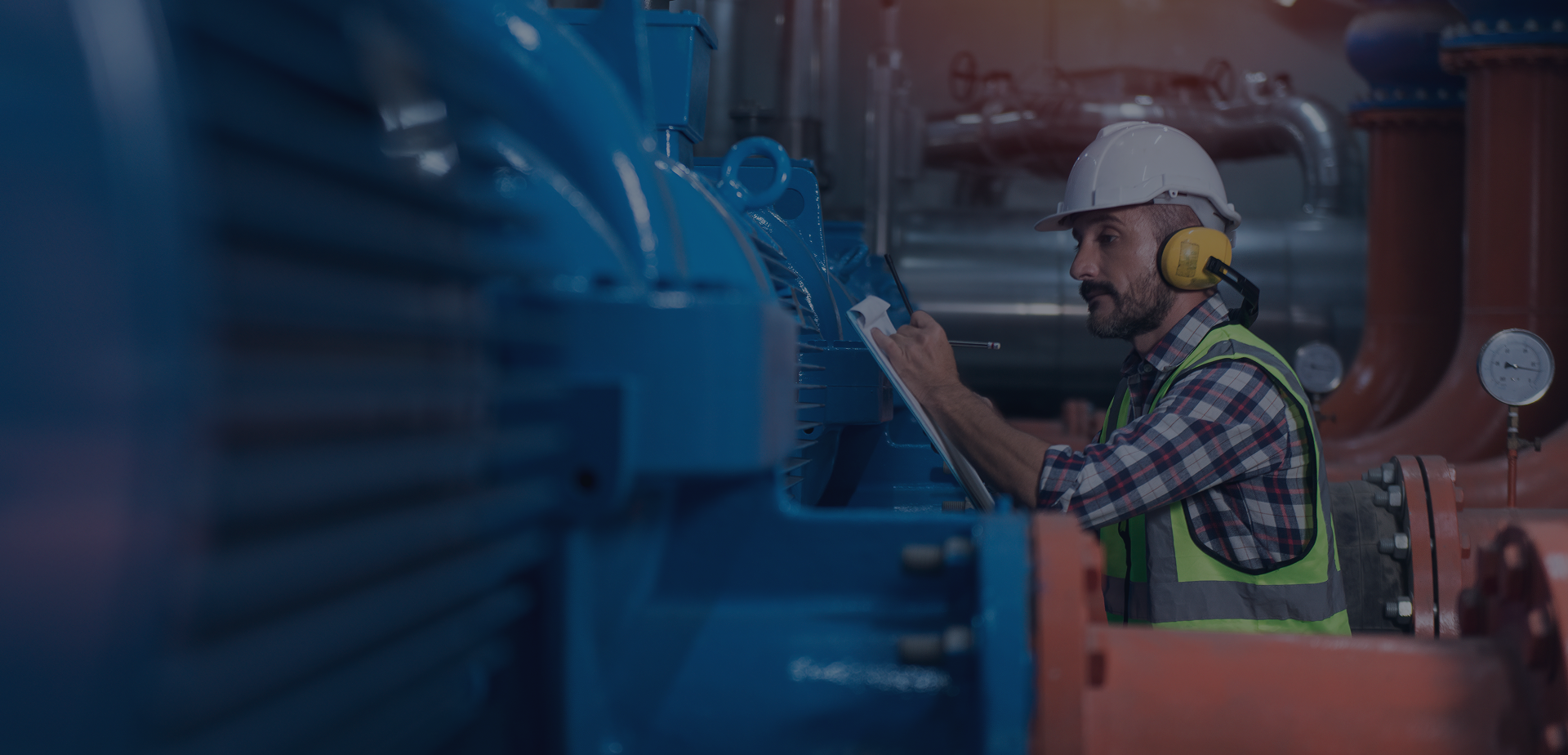 Industrial worker at compressor facility
